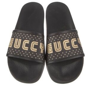 Gucci x Sega Black Slides with Gold “GUCCY” Logo